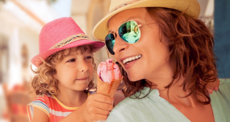 Mother and Daughter Share Ice Cream Cone at Barefoot Landing